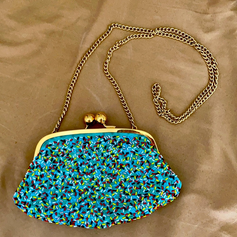 Moschino boutique sprinkle clutch.